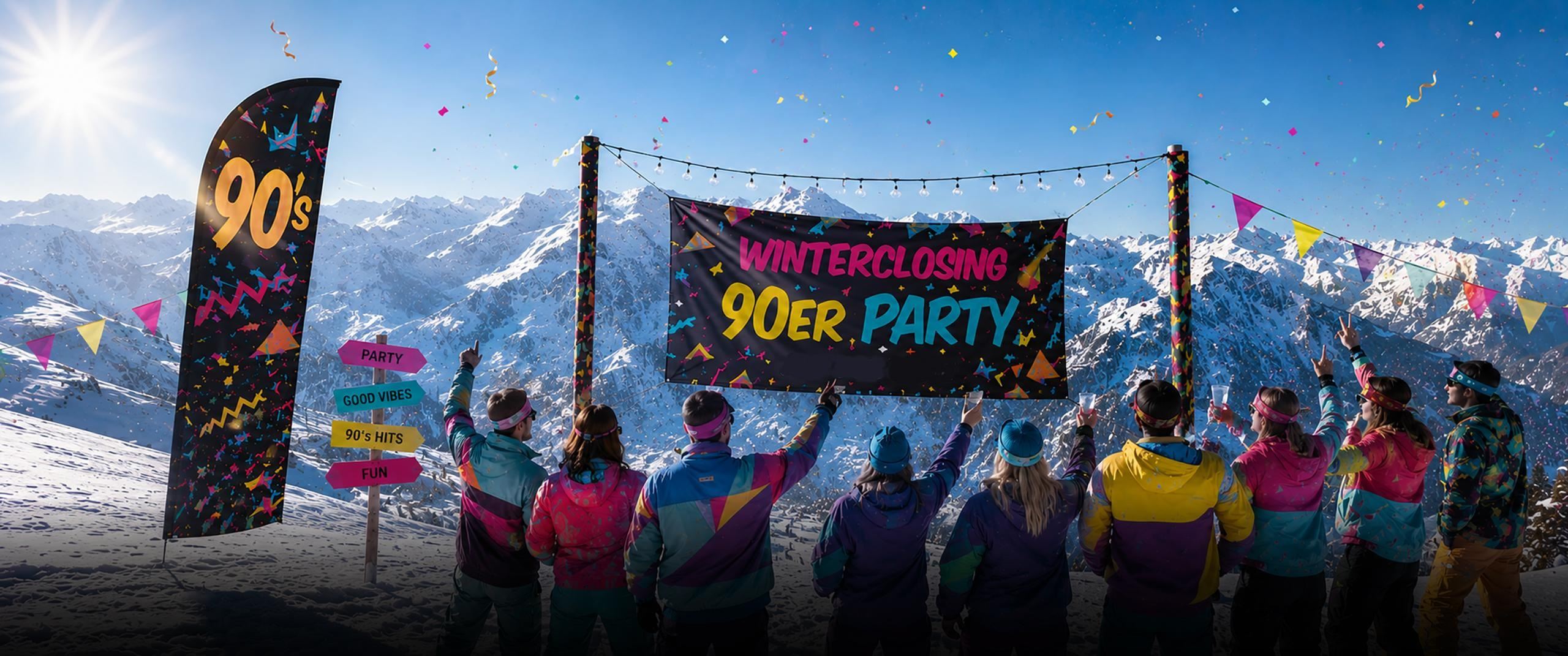 A group of people is celebrating a 90s party in the snow. In the background, impressive mountains and festive decorations can be seen.