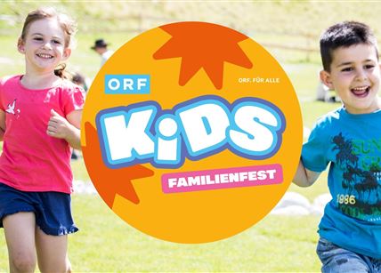 Children are happily running across a green meadow at the family festival. In the foreground, a prominent logo with the text "ORF Kids Family Festival" can be seen.